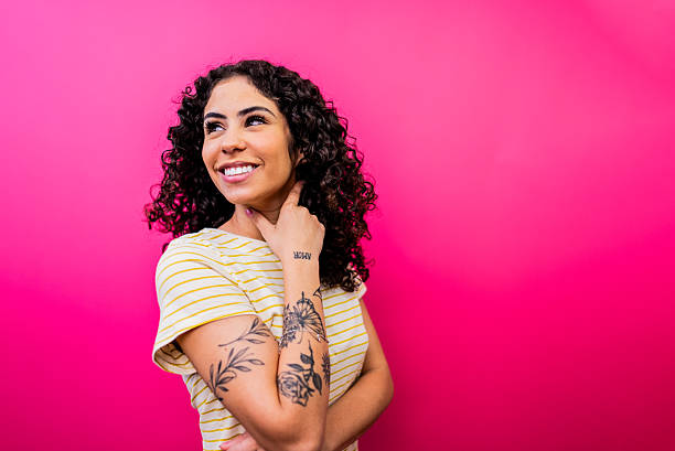 istock Young woman contemplating - Studio Shot 2253802858