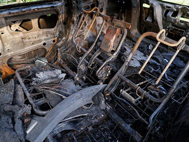 istock Charred interior of a destroyed vehicle after fire 2253803411