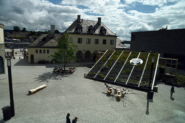 The National Museum is a museum in Oslo, which hosts the norwegian state collection in paintings, design and more. The new building opened in 2022 was planned by Kleihues + Schuwerk architects. The image shows the view out of a window at the museum captured during summer season.