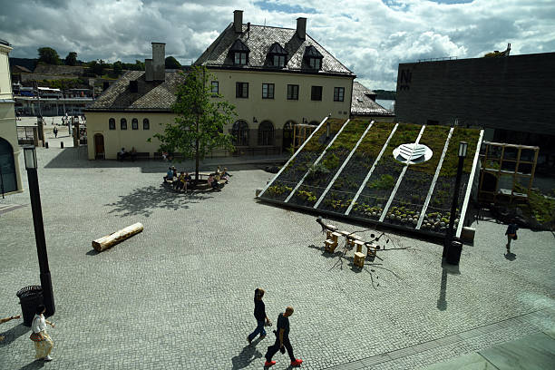 The National Museum is a museum in Oslo, which hosts the norwegian state collection in paintings, design and more. The new building opened in 2022 was planned by Kleihues + Schuwerk architects. The image shows the view out of a window at the museum captured during summer season.