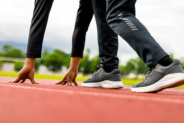 istock Runner at Starting Line Ready to Sprint on Track 2253814450