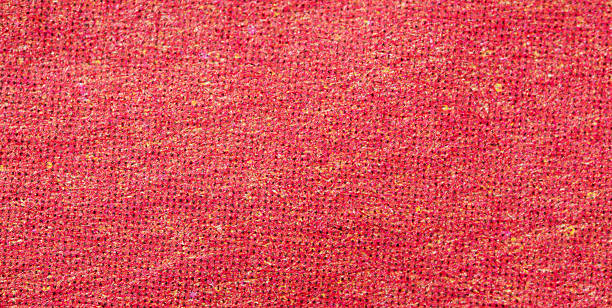 istock Red Halftone Grid on Rough Textured Paper 2253816659