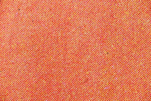 Orange cotton fabric cloth texture for background, natural textile pattern.