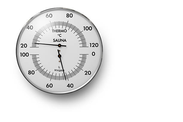 Wooden thermometer showing high temperature on sunny day