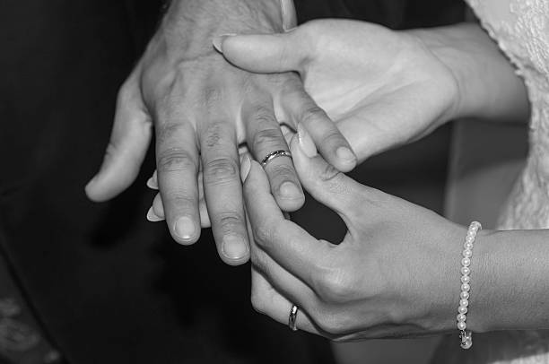 istock Marriage proposal with exchange of wedding rings 2253825812