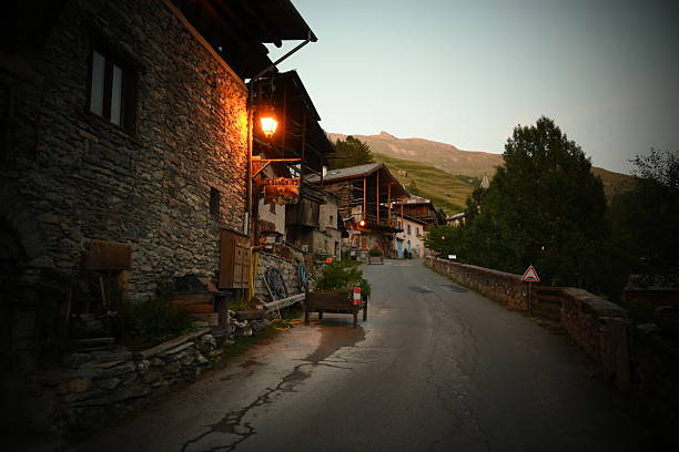 A street in a little village in french alps. The picture show the ambiance in the late evening.