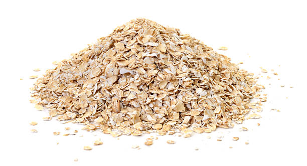 istock Heap of oat flakes isolated on white background 2253830048