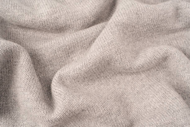 istock Soft grey merino wool sweater texture as a background. 2253830563