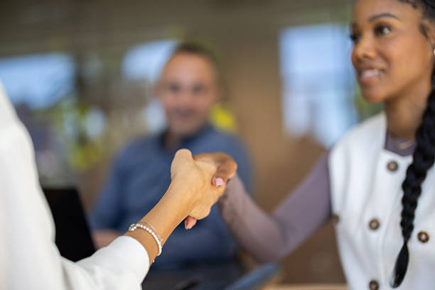 istock Diverse Business People Shaking Hands 2253830862