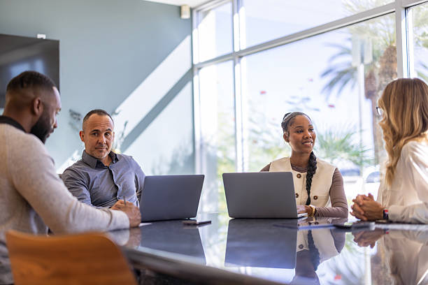 istock Business meeting in a modern office with a diverse group team 2253830973