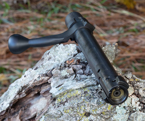 istock Bolt removed from a bolt action gun outdoors 2253836775