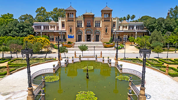 Glorieta de Juanita Reina in the Parque de María Luisa in Sevilla, with a building of Arabesque style, currently closed,  that was once a drinking den and later the headquarters of the Park Guard