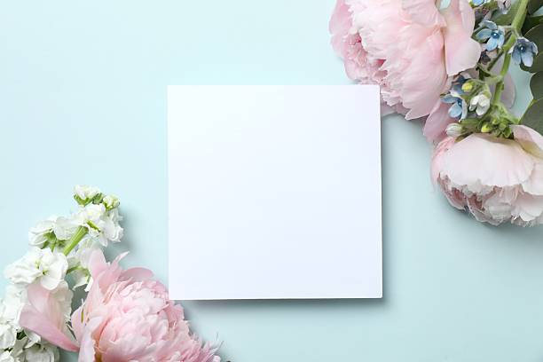istock Beautiful pink peonies with paper card,  space for text 2253839787