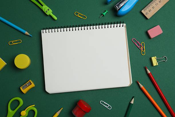 istock Flat lay with school stationery on green background, top view 2253840147