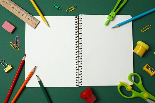 istock Flat lay with school stationery on green background, top view 2253840149