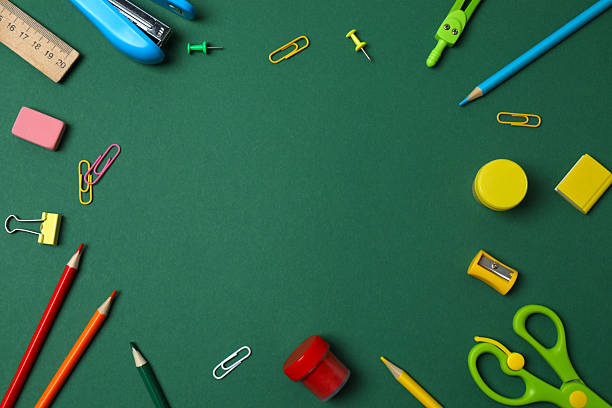 istock Flat lay with school stationery on green background, top view 2253840153
