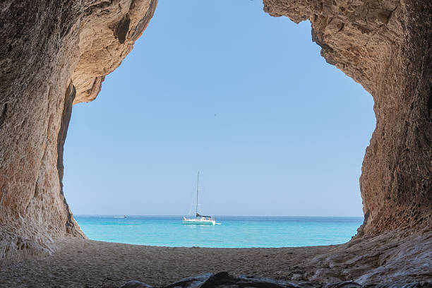 istock Sailboats Through Rock Arch 2253846845
