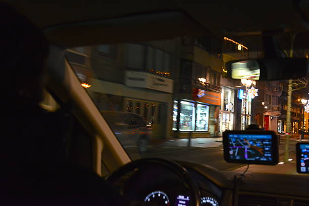 Knokke-Heist, West-Flanders, Belgium -  December 27, 2025: motion blur view from inside a car Christmas lights during the evening in the main shopping street Avenue Lippens