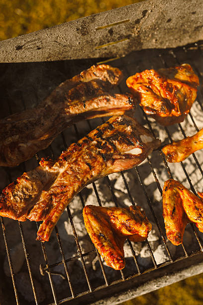 Join us for a delightful BBQ event with savory Grilled Ribs and mouthwatering Chicken Wings, perfect for summer gatherings with family and friends. Dont miss this culinary feast