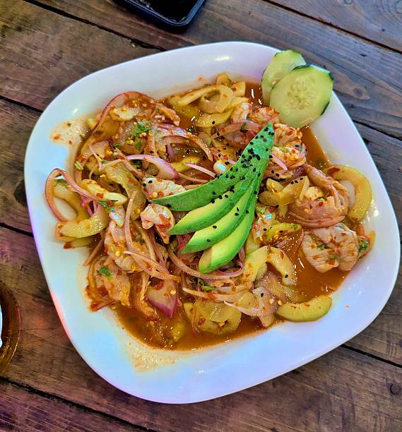 istock Vibrant red shrimp aguachile with avocado and cucumber 2253850785