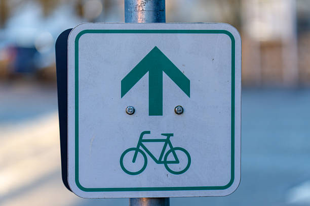 Bicycle sign indicating straight direction for bike path