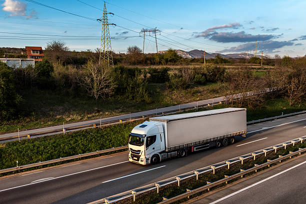 istock Big truck with semi-trailer on highway 2253855619