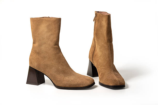 istock Brown Female Suede Heeled Ankle Boots 2253855625