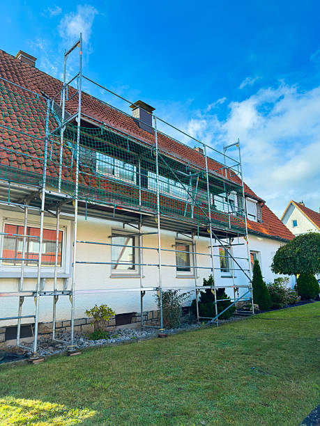 istock Setting Up Scaffolding for Home Renovation A Comprehensive Guide to Enhancing the Exterior Appearance and Structure of a Residential Building to Ensure Safety During Renovation Projects 2253859934