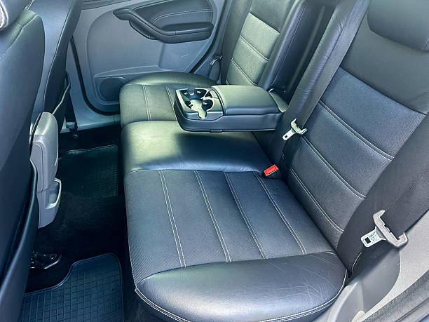 istock This luxurious car interior showcases a spacious backseat designed for comfort, featuring premium leather upholstery and a stylish center console for added convenience and elegance 2253861874