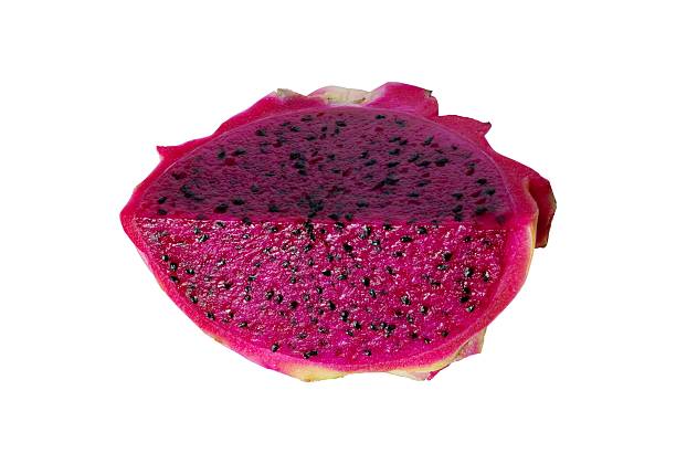 istock cut of dragon fruit isolated on white 2253866594