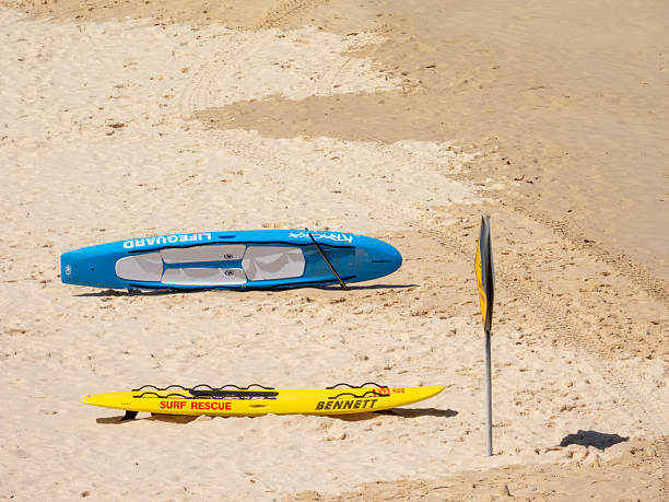 North Bondi Beach, New South Wales, Australia - April 8, 2007: A “SURF RESCUE” surfboard used by the North Bondi Surf Life Saving Club lies on North Bondi Beach awaiting use in an emergency.