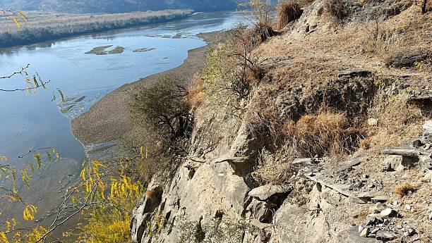 istock Majestic Soan River winding through Potohar plateau cliffs and sands 2253877218
