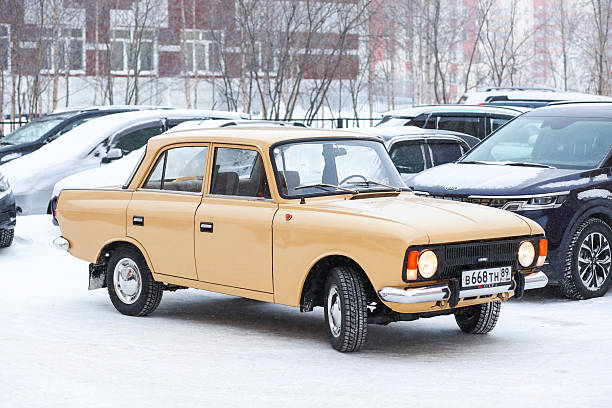 Novyy Urengoy, Russia - November 23, 2025: Soviet classic saloon car Izh-Moskvich-412IE-028 in the city street.