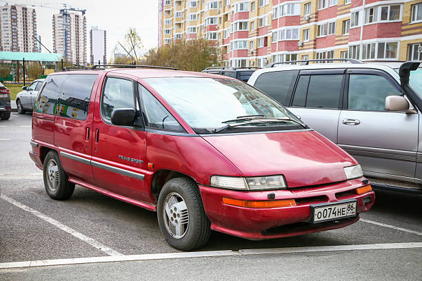 Tyumen, Russia - October 6, 2025: Old American van Pontiac Trans Sport in the city street.