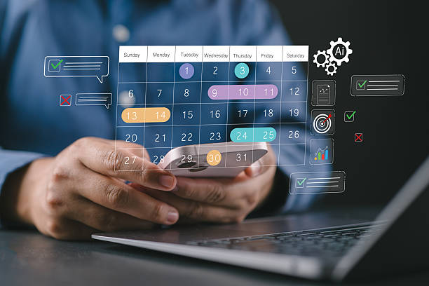 istock Time management and digital workflow concept. Man using smartphone calendar app to manage task, plan schedules, set reminder and track productivity with AI automation helping monitor progress. 2253882187