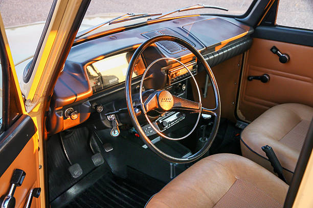 Novyy Urengoy, Russia - August 17, 2025: Interior of the Soviet classic saloon car Izh-Moskvich-412IE-028 in the city street.