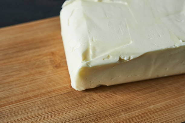 istock Butter on a wooden board. 2253884663