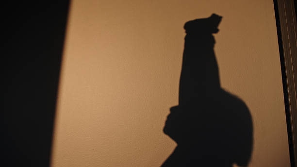 istock Shadow of a woman stretching. 2253885963