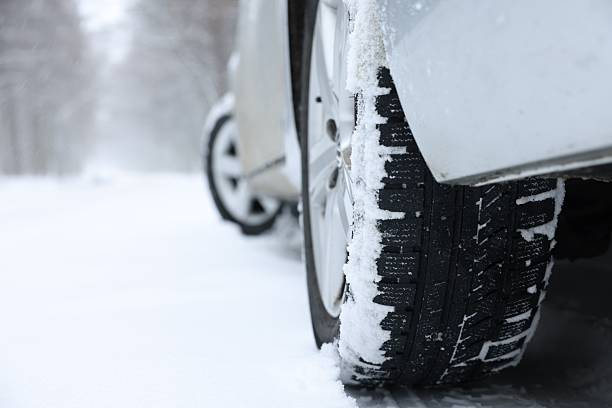 istock Car with winter tires on snowy road outdoors, closeup. Space for text 2253886291