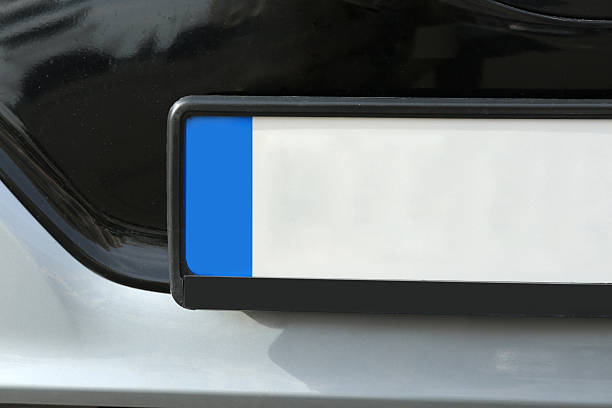 istock Car with vehicle registration plate, closeup view 2253887337