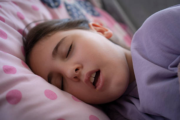 istock Deep sleeping children girl close up portrait 2253888551
