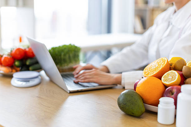 istock Nutritionist Working with Fruits 2253889615