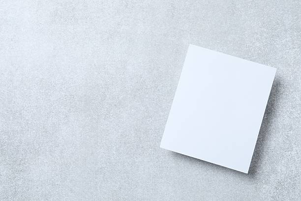 istock Paper card on marble background 2253893363