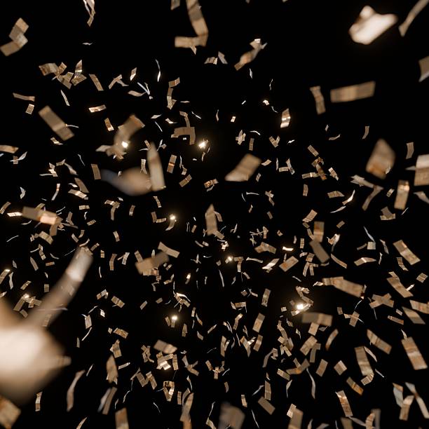 istock Falling confetti against a dark background, creating a festive and celebratory atmosphere. 2253902905