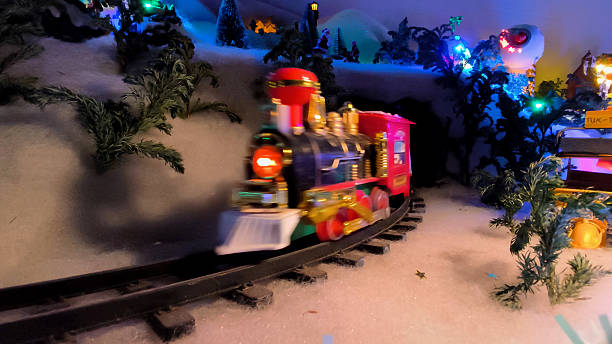istock Toy Train On Christmas Tracks 2253905000