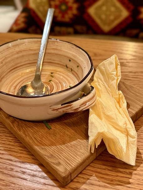 istock Homemade Soup In Rustic Setting, Peaceful Breakfast Featuring Cream Soup On Wooden Table, Serene Morning Meal Showcasing Ceramic Bowl With Leftover Soup On Rustic Wood Surface 2253908127