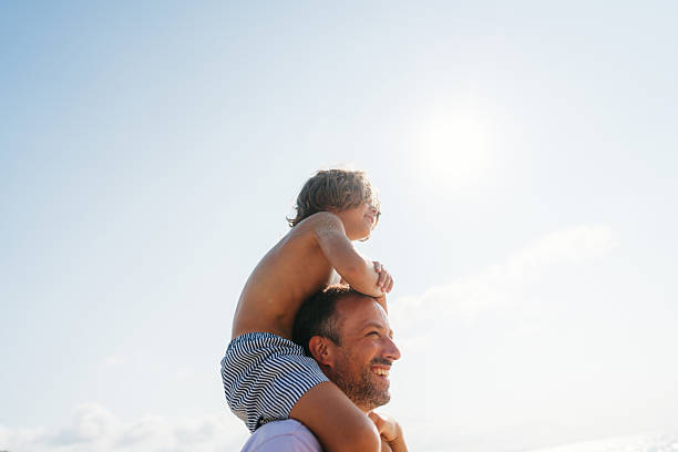 istock Happy moments on the beach with my boy 2253908375
