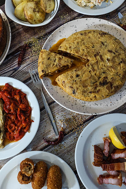 istock Traditional spanish tortilla de patatas with assorted tapas dishes 2253908813