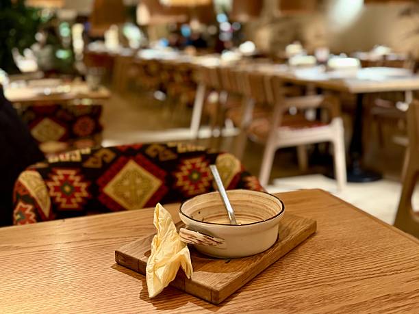 istock Homemade Soup In Rustic Setting, Peaceful Breakfast Featuring Cream Soup On Wooden Table, Serene Morning Meal Showcasing Ceramic Bowl With Leftover Soup On Rustic Wood Surface 2253909226