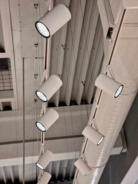 istock ceiling of the corridor in the plasterboard soffit is equipped with light halogens illuminating the ramp on the stage or in the shop. the goods look better if there are strong lamps in the ceiling 2253910187